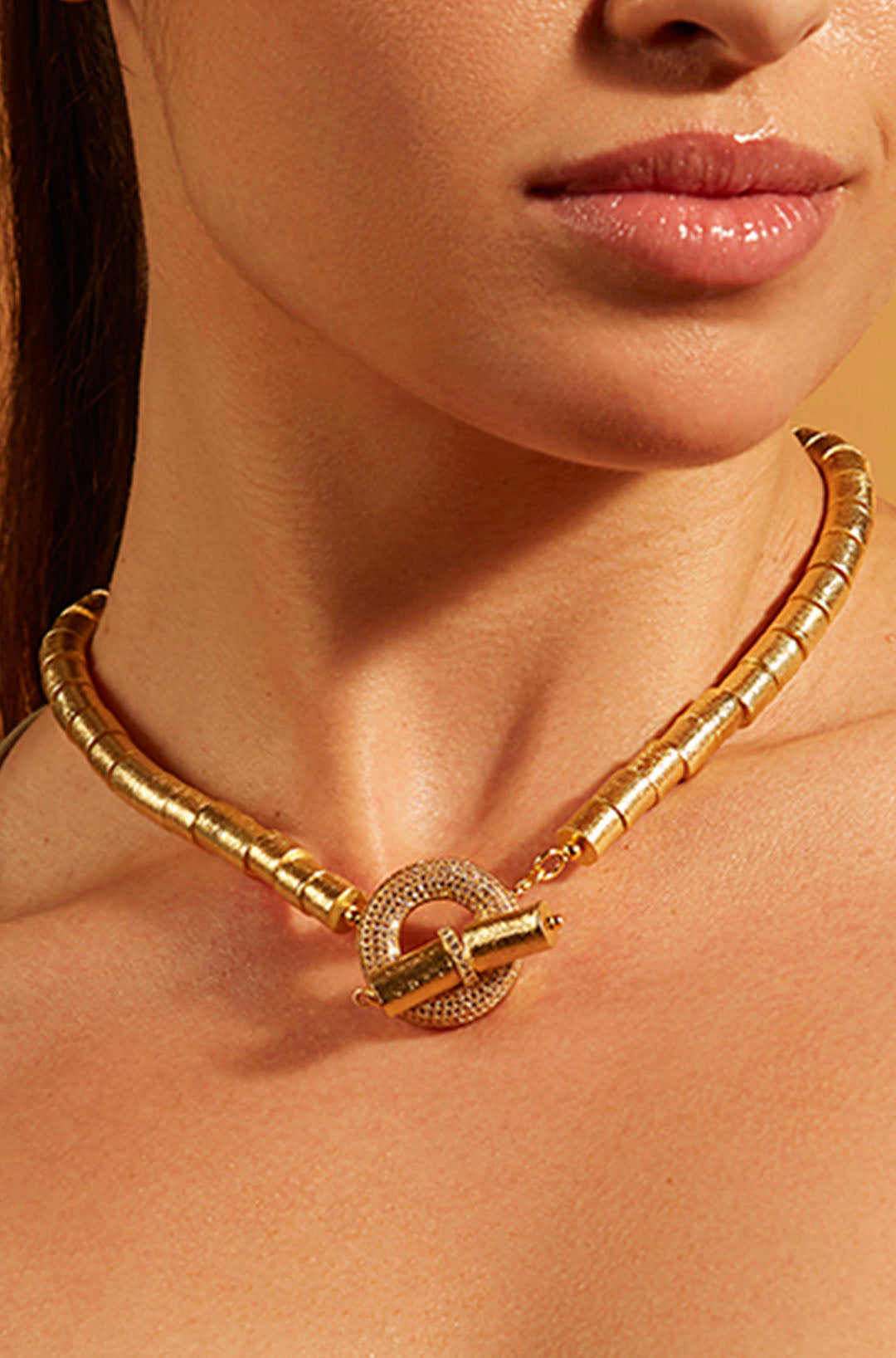 Toggle lock gold train necklace